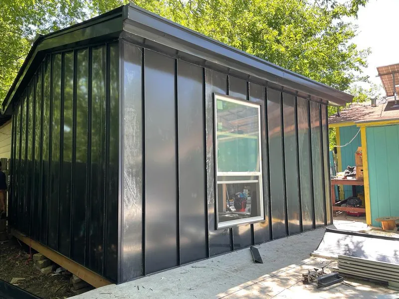 Black standing seam metal wall panels for Metal Roof Installation in Bethel