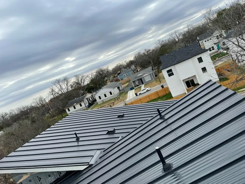 Standing seam metal roof panels with vents for Skylight Repair in Bethel